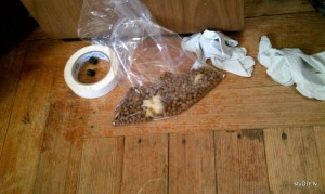Bag full of cat food pulled from speaker cabinet Bag full of cat food pulled from speaker cabinet